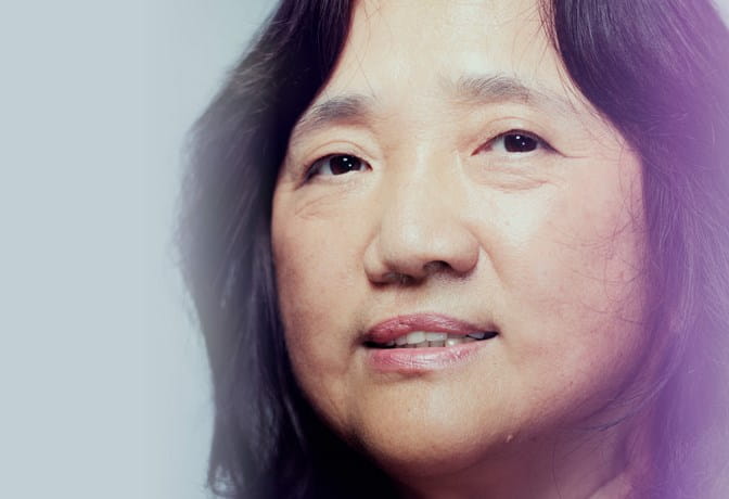 A close up picture of Dr. Feng Liu looking at the camera