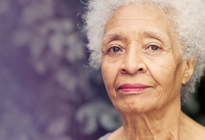 Mature black woman looking at camera