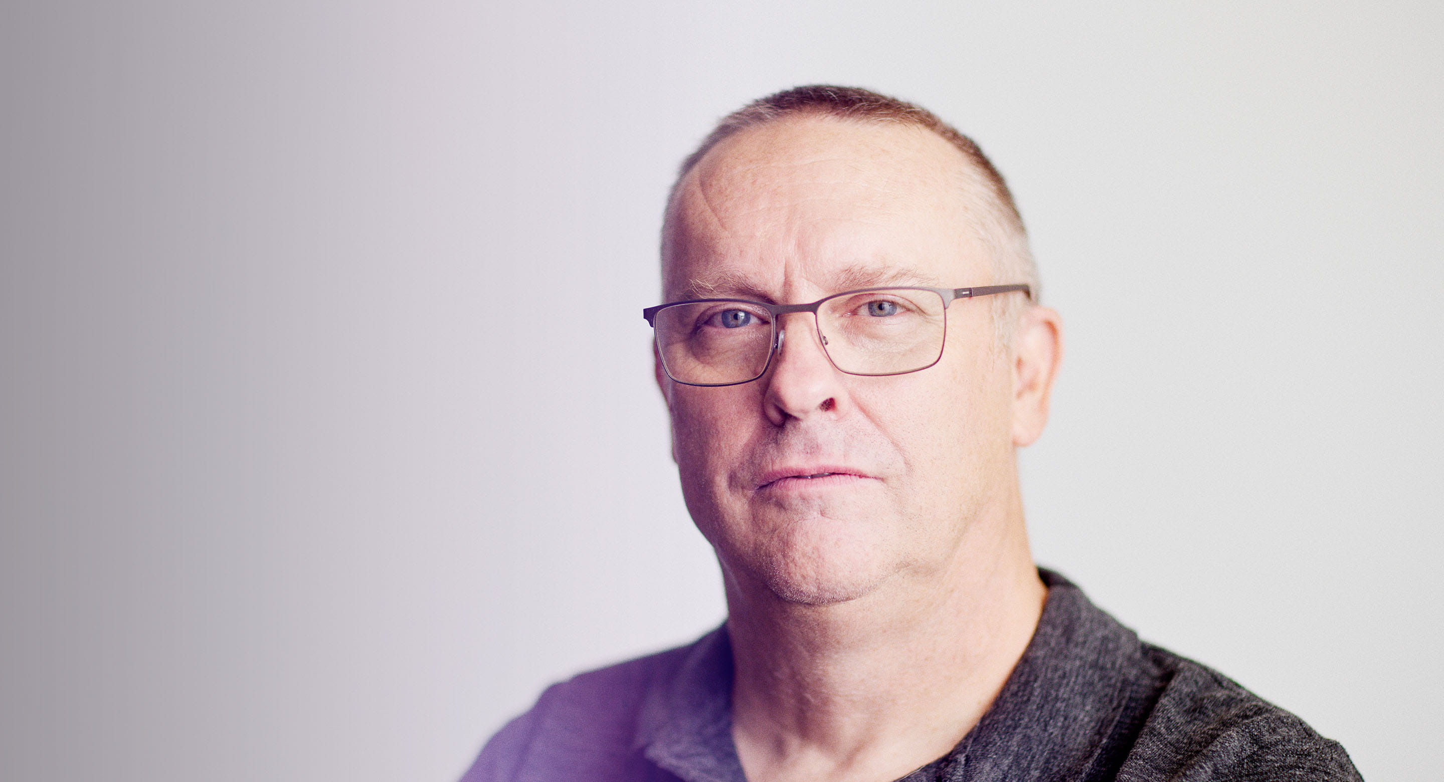 Middle-aged white man with glasses