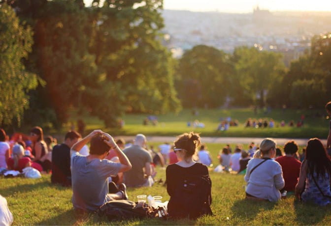 Group of people sitting in a park