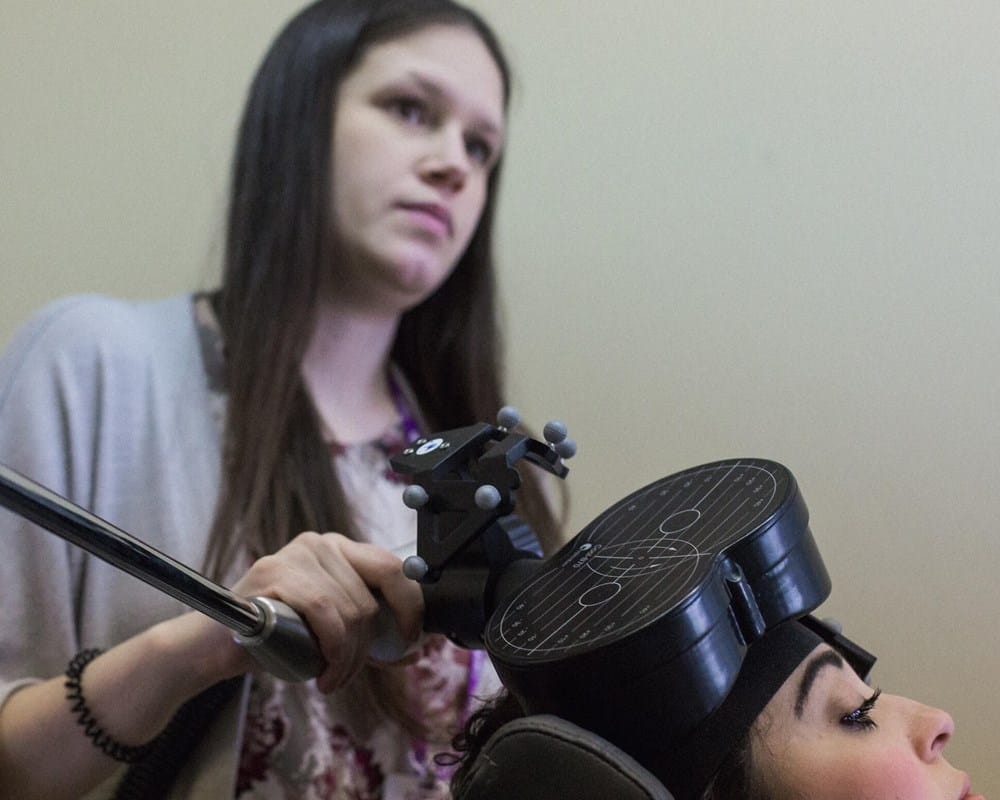 Technician working in magnetic stimulation therapy