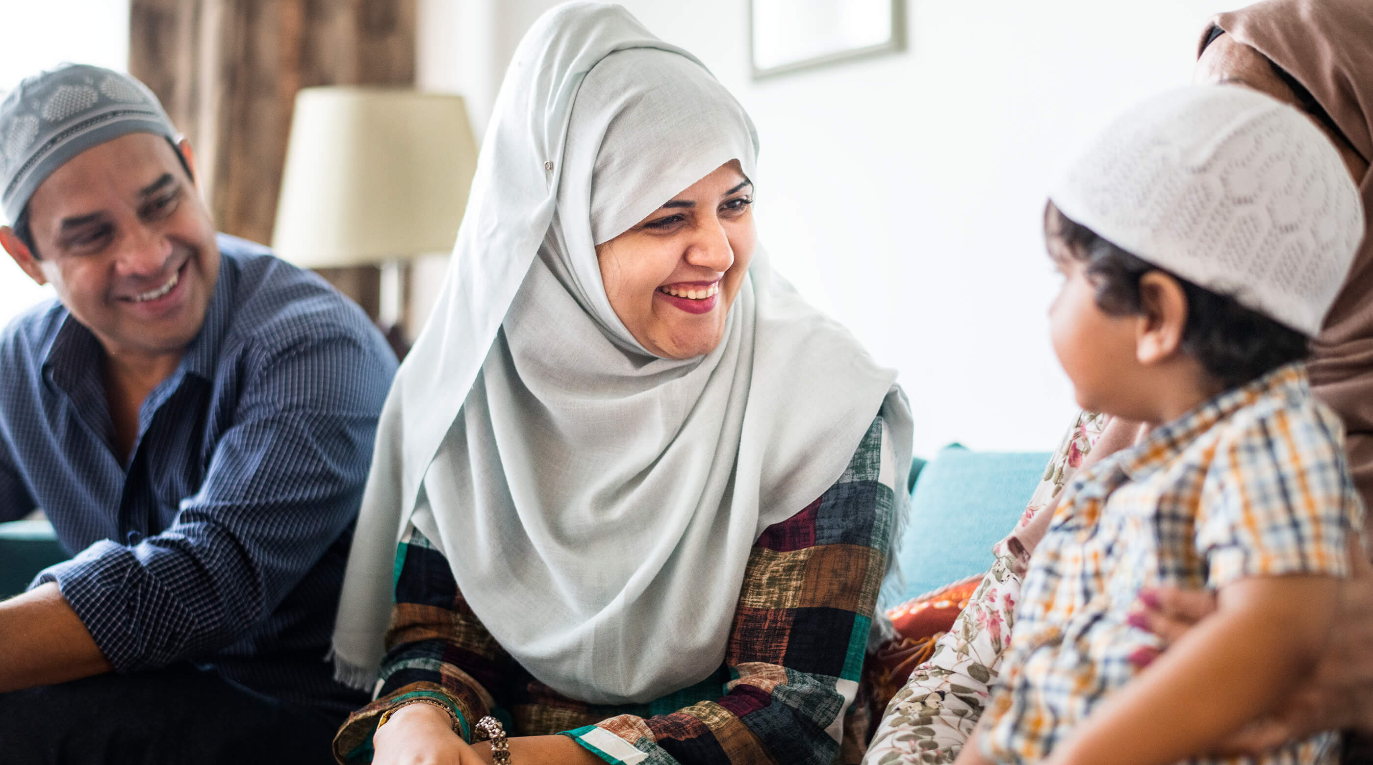 Muslim Asian family with child