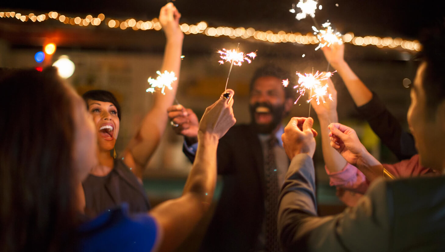 People having a celebration with sparklers