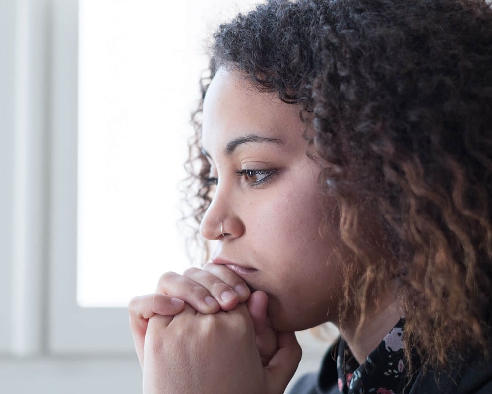 Young woman looking sad