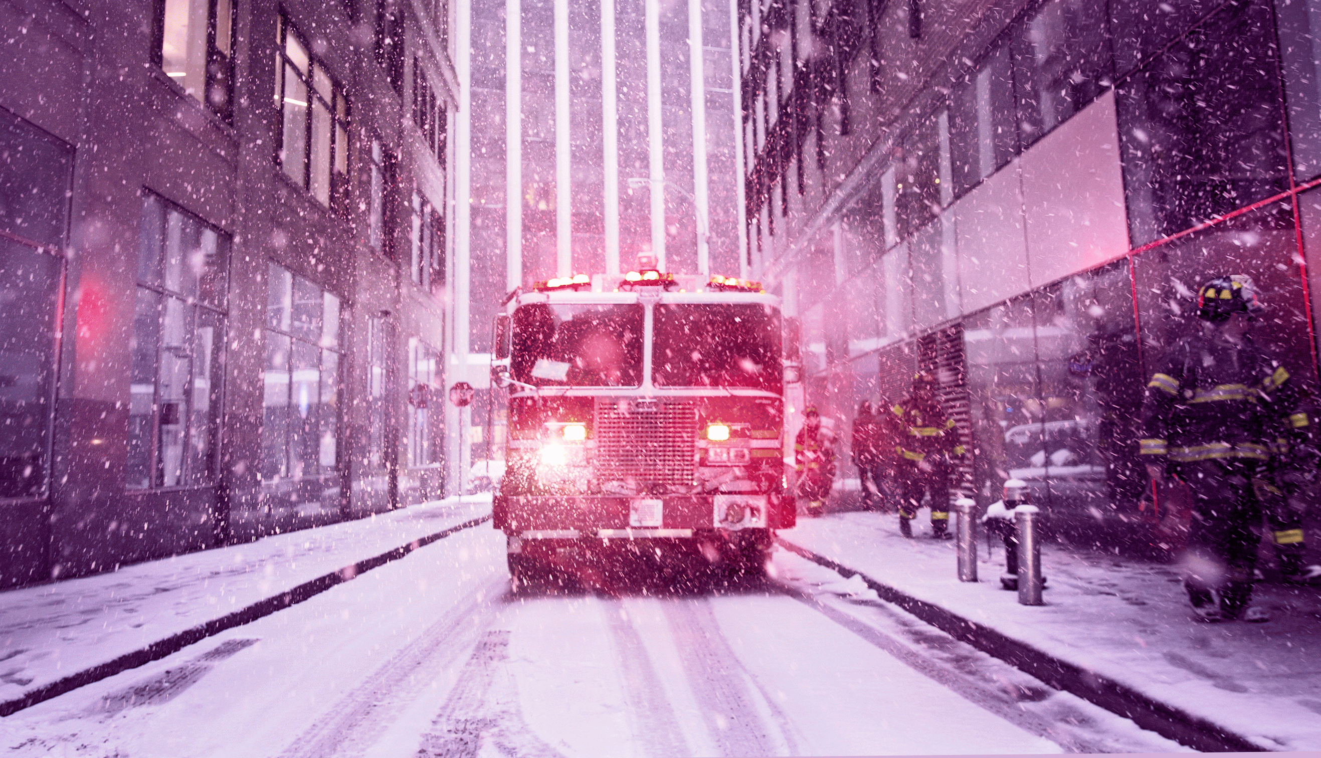 Firetruck on snowy street.