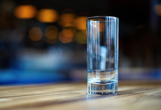 An empty glass on a table