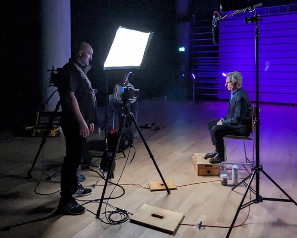 Image of a camera crew filming at CAMH