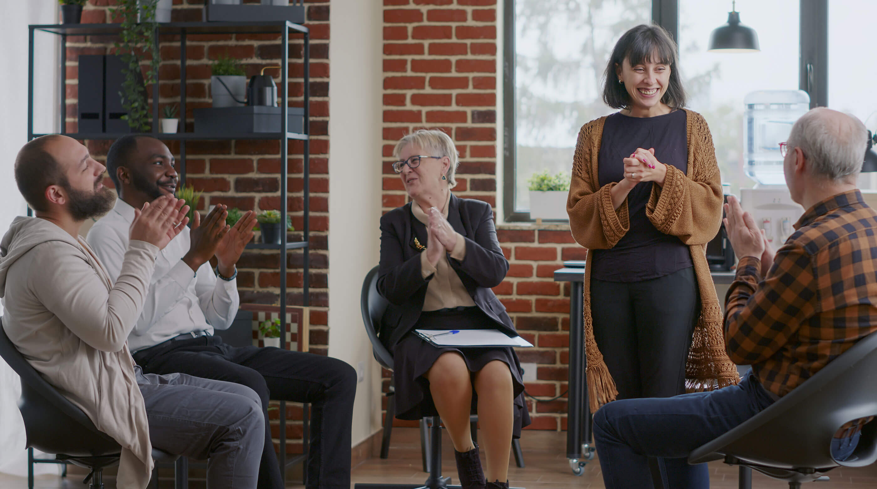 Adults in a group therapy session